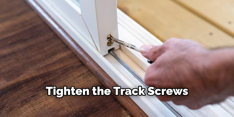 Tighten the Track Screws