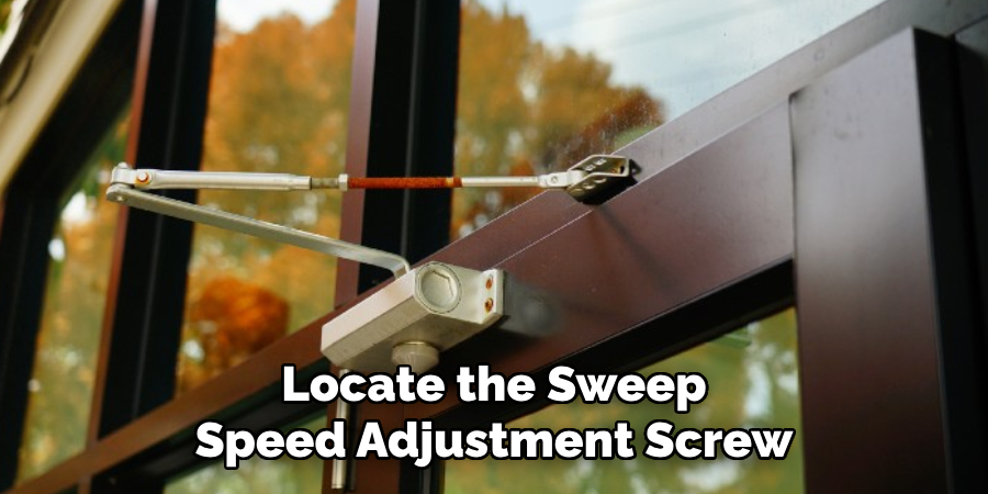 Locate the Sweep Speed Adjustment Screw