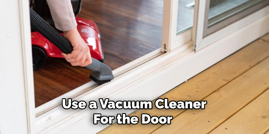 Use a Vacuum Cleaner For the Door