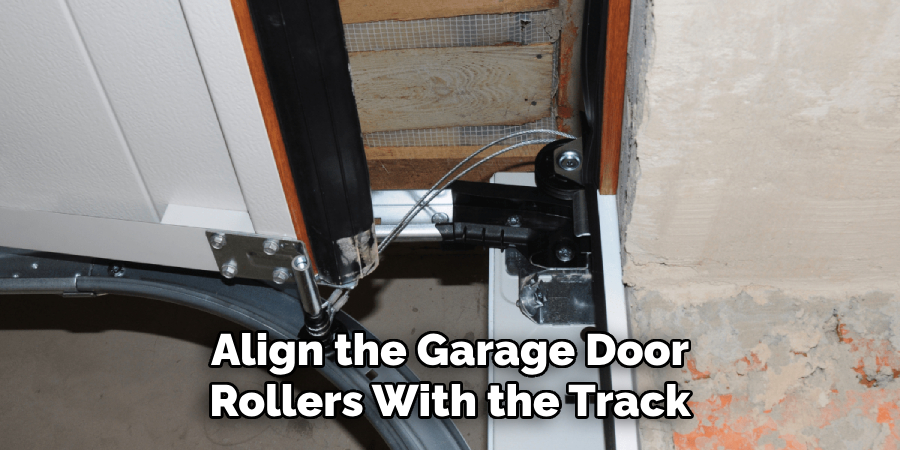 Align the Garage Door
Rollers With the Track