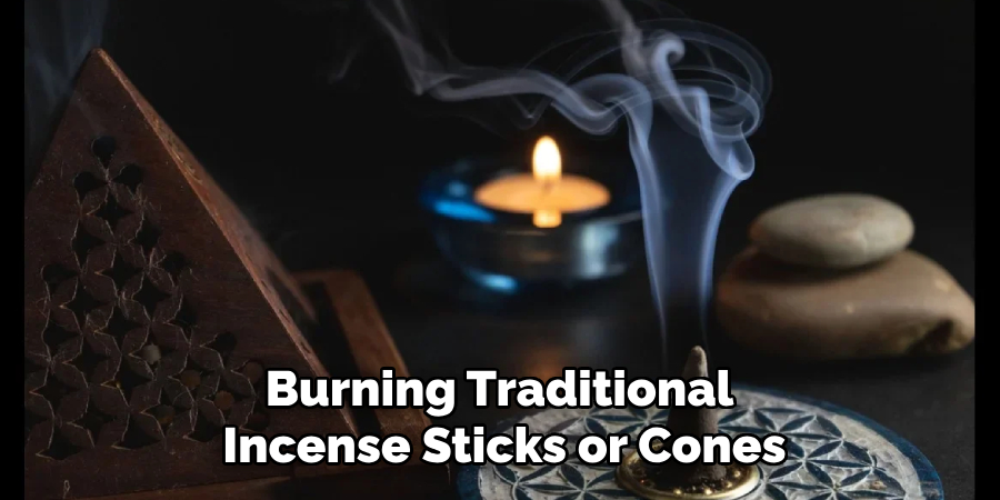 Burning Traditional Incense Sticks or Cones