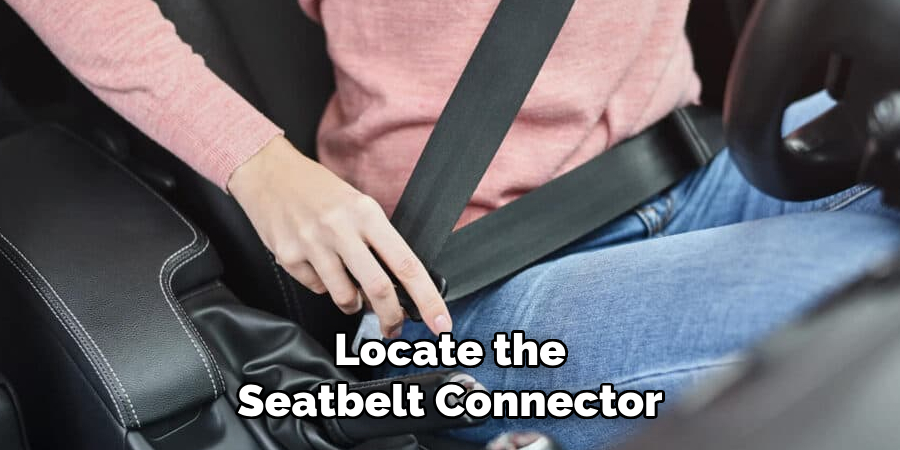 Locate the Seatbelt Connector