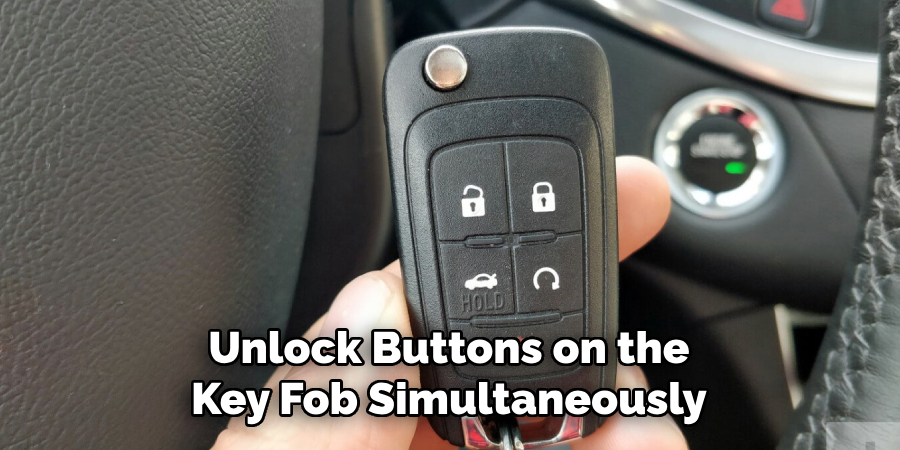  Unlock Buttons on the 
Key Fob Simultaneously