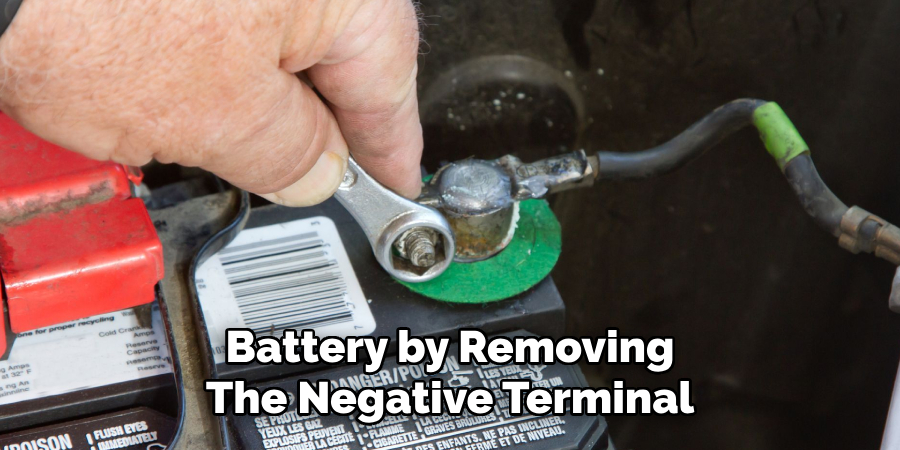 Battery by Removing 
The Negative Terminal