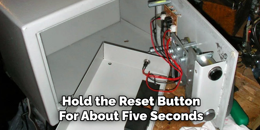 Hold the Reset Button
For About Five Seconds