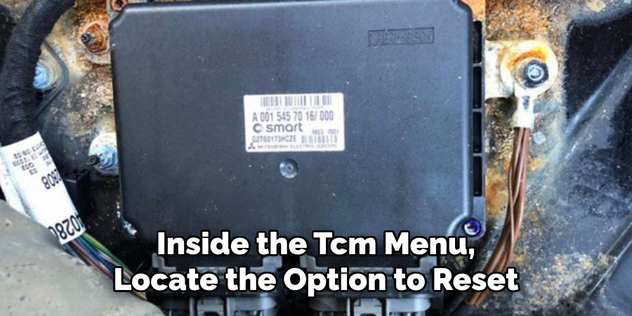 Inside the Tcm Menu, 
Locate the Option to Reset