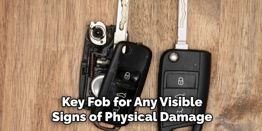 Key Fob for Any Visible
Signs of Physical Damage