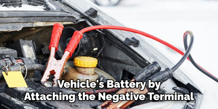 Vehicle's Battery by 
Attaching the Negative Terminal