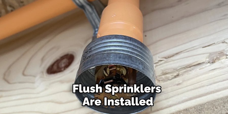 Flush Sprinklers
 Are Installed