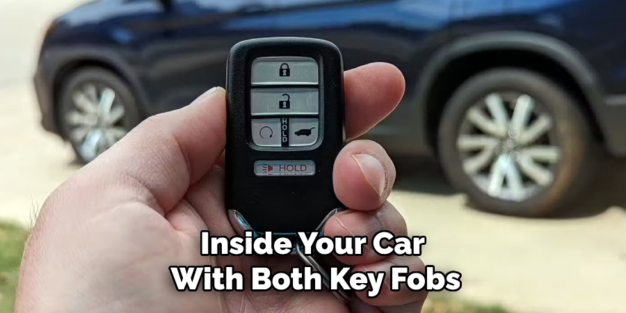 Inside Your Car 
With Both Key Fobs