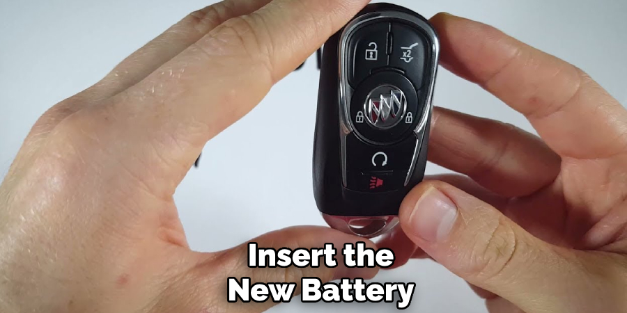 Insert the
New Battery