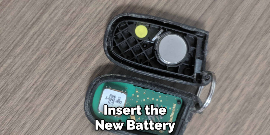 Insert the New Battery