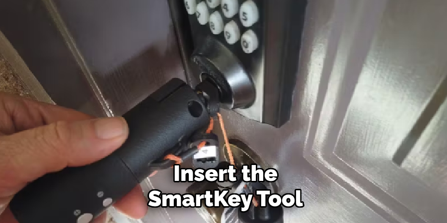Insert the SmartKey Tool