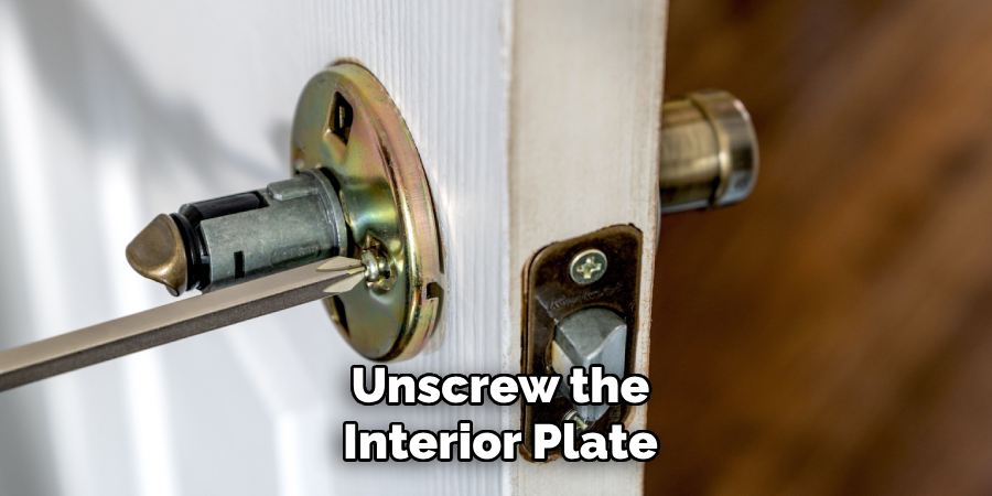 Unscrew the Interior Plate