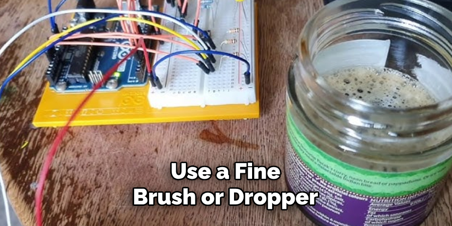 Use a Fine Brush or Dropper