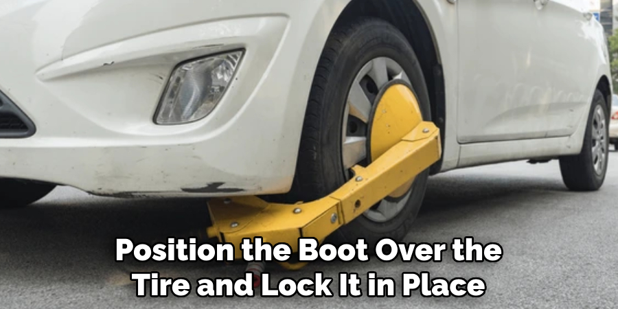 Position the Boot Over the
Tire and Lock It in Place