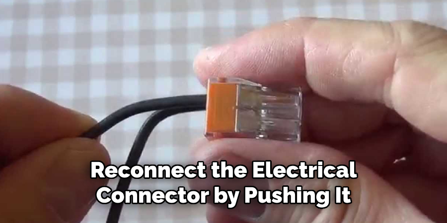 Reconnect the Electrical
Connector by Pushing It