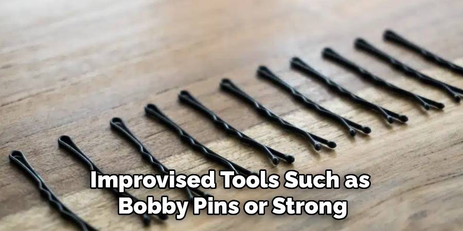 Improvised Tools Such as
Bobby Pins or Strong