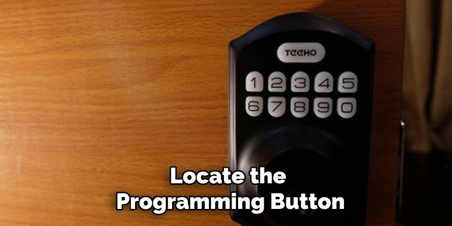 Locate the
Programming Button