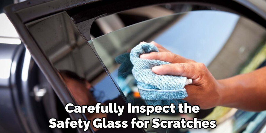 Carefully Inspect the
Safety Glass for Scratches