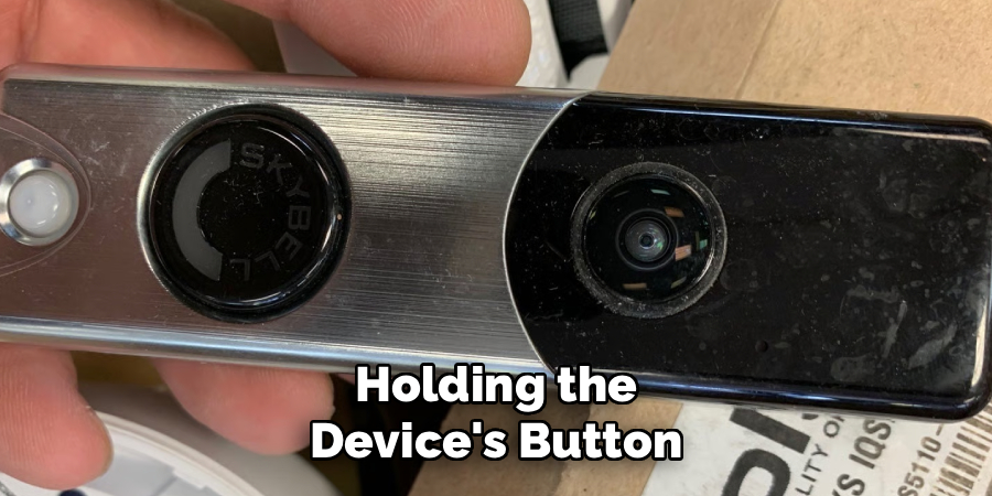 Holding the Device's Button