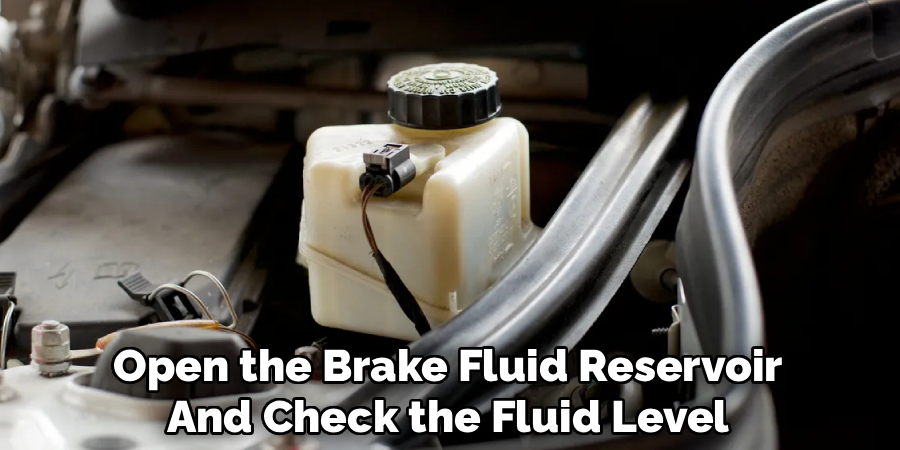 Open the Brake Fluid Reservoir
And Check the Fluid Level