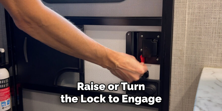 Raise or Turn the Lock to Engage