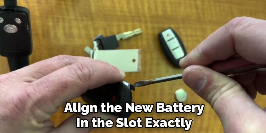 Align the New Battery
In the Slot Exactly