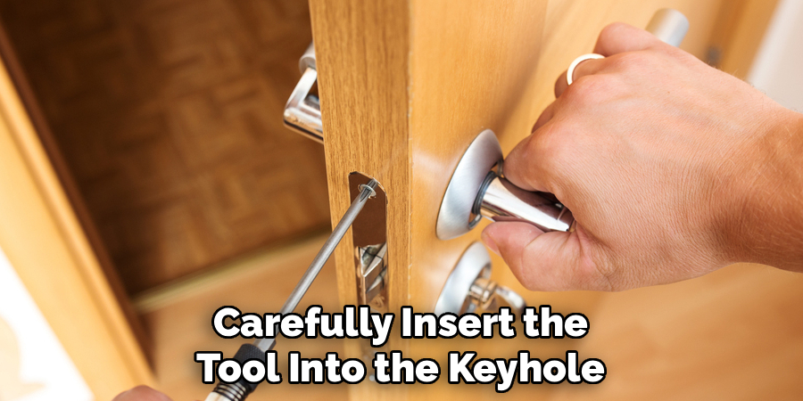 Carefully Insert the
Tool Into the Keyhole