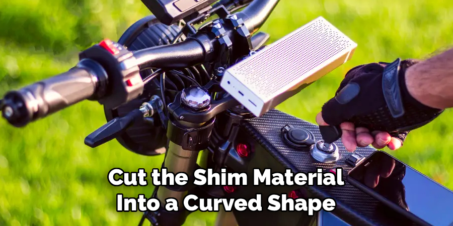 Cut the Shim Material Into a Curved Shape