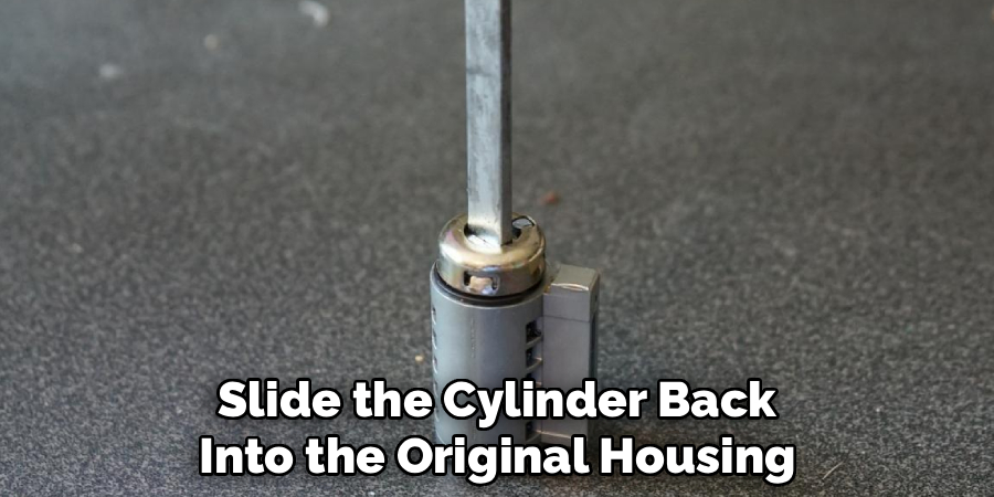 Slide the Cylinder Back
Into the Original Housing