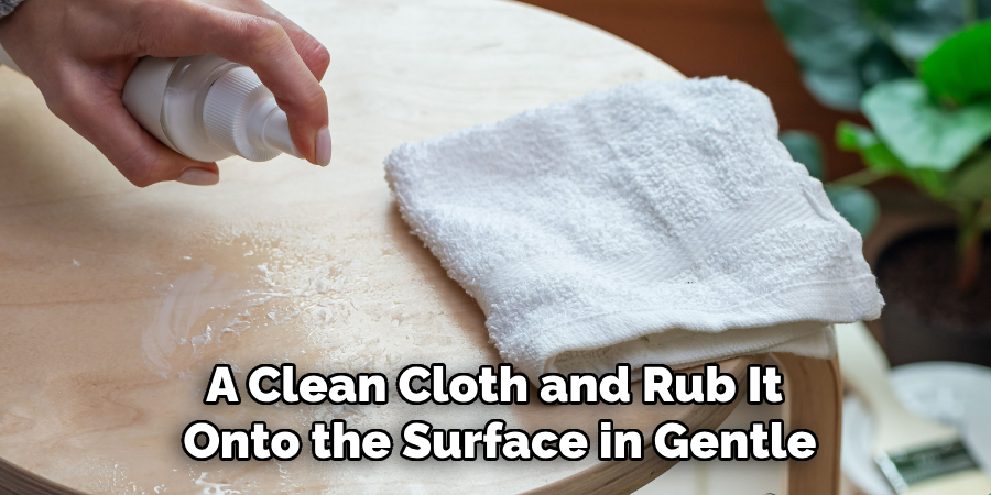 A Clean Cloth and Rub It Onto the Surface in Gentle