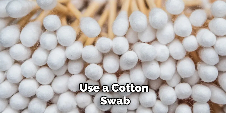 Use a Cotton
 Swab