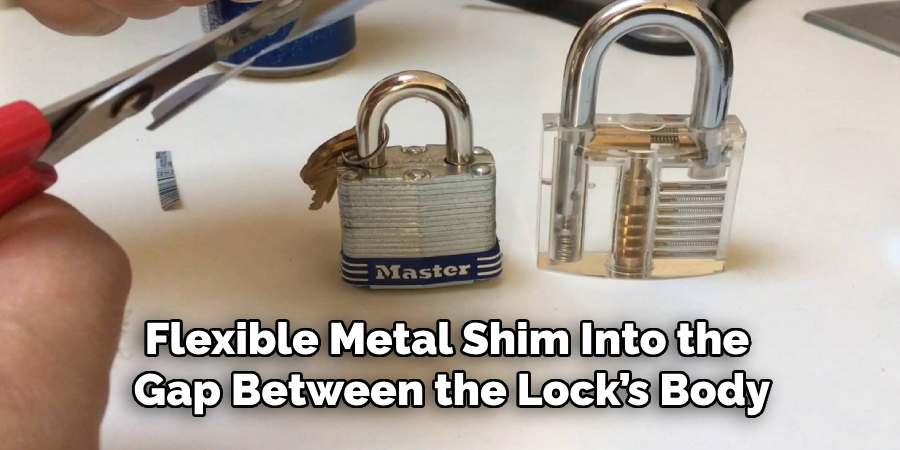 Flexible Metal Shim Into the
Gap Between the Lock’s Body